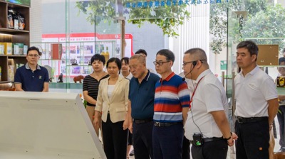 贵港市政协副主席谭汝新一行到我校考察学习